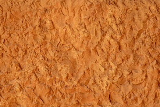 texture of a natural rough-cut stone of an ancient building photo