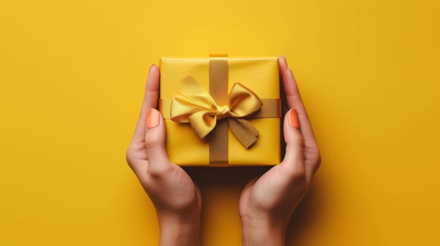 AI generated A Yellow Background Showcasing a Gift Box Held by Human Hands in Close-up View photo