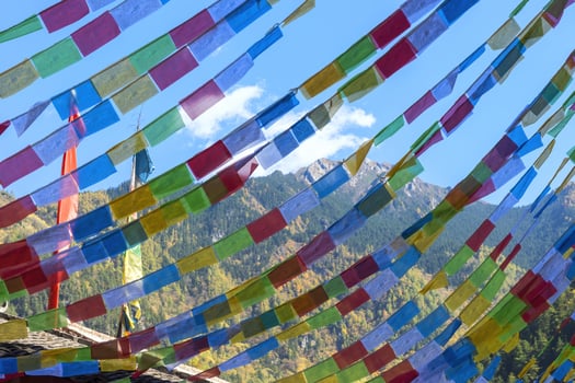 Prayers flags at Shuzheng Tibetan village, Jiuzhaigou National Park, Sichuan Province, China, Unesco World Heritage Site photo
