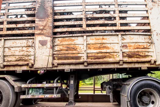 Scrap steel in the old steel crate in the truck photo
