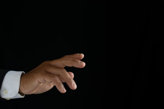 Businessman's hands working using a mobile phone photo