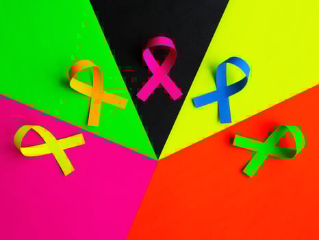World cancer day background. Colorful ribbons, cancer awareness. photo