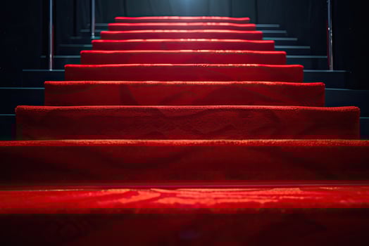 AI generated Red carpet on the stairs on a dark background. The path to glory, victory and success. photo