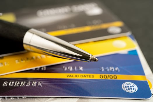 Credit card model on chart and graph paper. Finance development, Banking Account, Statistics, Investment. photo