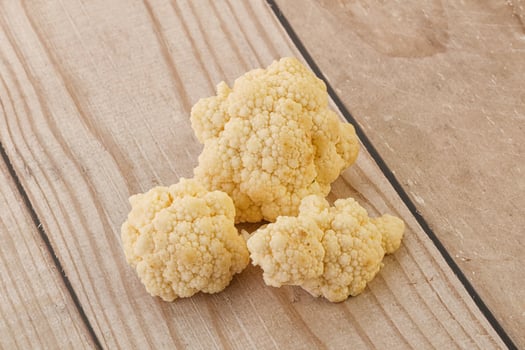 Raw white cauliflower cabbage heap photo