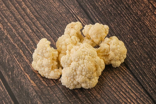 Raw white cauliflower cabbage heap photo