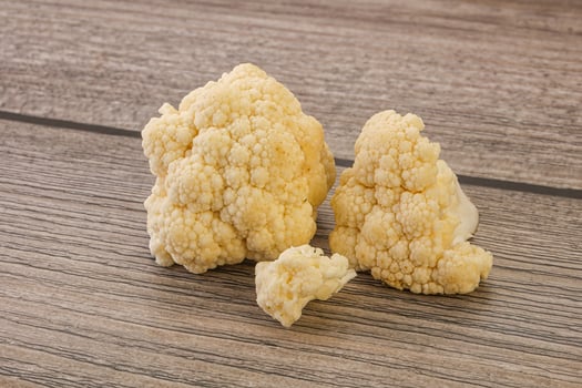 Raw white cauliflower cabbage heap photo