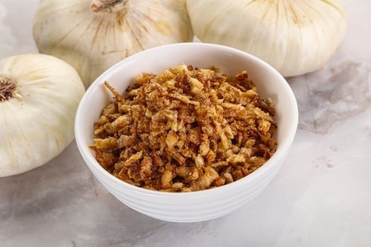 Dried roasted onion flakes for culinary photo