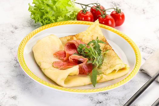 Russian pancake with salmon fish photo