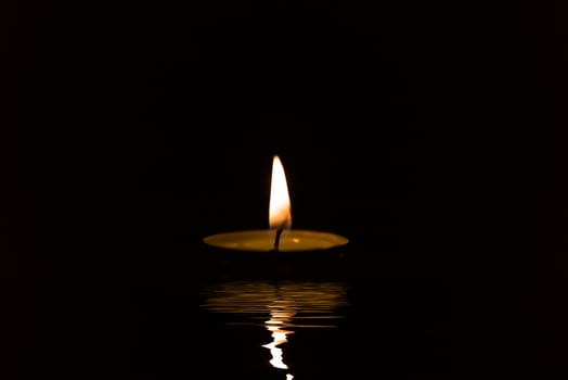 Close up of fire in the dark background photo