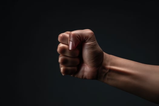 AI generated Human hand is fist in a dark studio background. photo