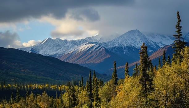 AI generated Snowy mountains of Alaska, landscape with forests, valleys, and rivers in daytime. Breathtaking nature composition background wallpaper, travel destination, adventure outdoors photo
