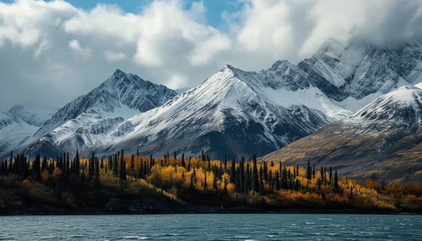 AI generated Snowy mountains of Alaska, landscape with forests, valleys, and rivers in daytime. Serene wilderness nature composition background wallpaper, travel destination, adventure outdoors photo