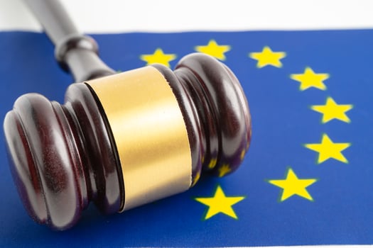 EU for judge lawyer and US dollar banknotes on USA America flag, finance concept. photo