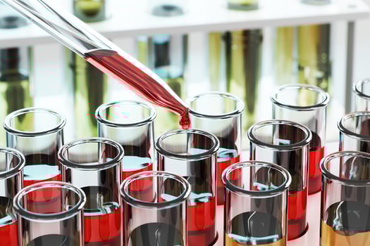 Red chemical solution dripping into test tube. scientific research or examination. 3D rendering photo