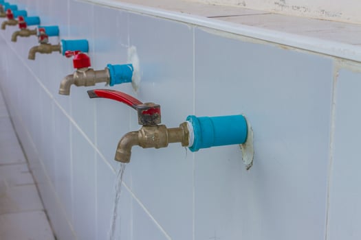 Row of dirty faucet is public property photo