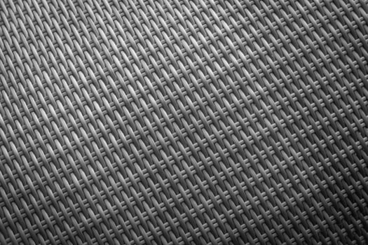 Synthetic rattan texture weaving background as used on outdoor garden furniture. photo