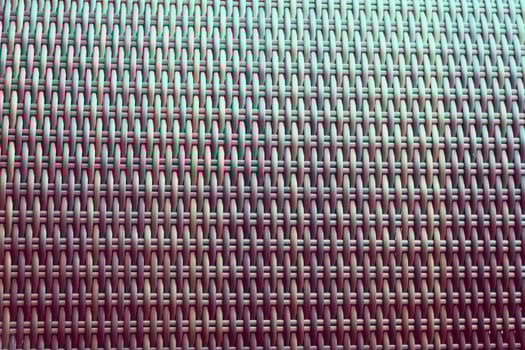 Synthetic rattan texture weaving background as used on outdoor garden furniture. photo