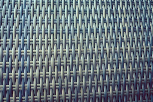 Synthetic rattan texture weaving background as used on outdoor garden furniture. photo