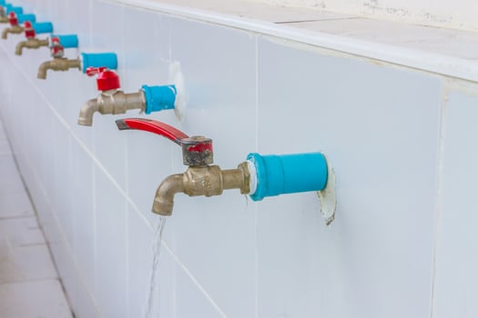 Row of dirty faucet is public property photo