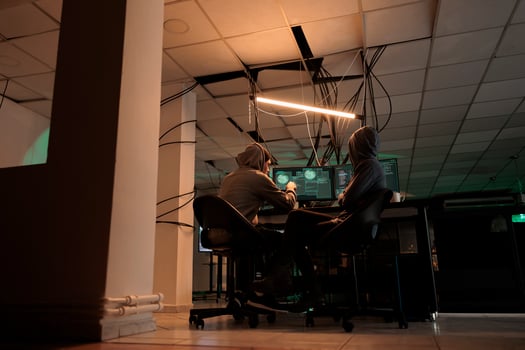 Cybercrime, hackers team coding internet virus program, hacking computer system, developers programming firewall. Criminals cracking password, developing malicious software photo