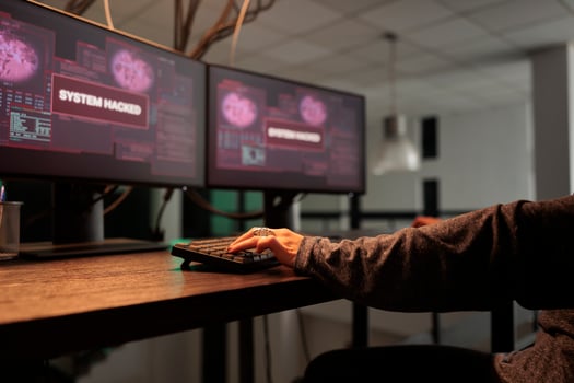 Woman hacker coding virus program, typing on keyboard. Cyberattack, online criminal programming malicious software and malware, hacking computer system, writing encryption. Close up. photo