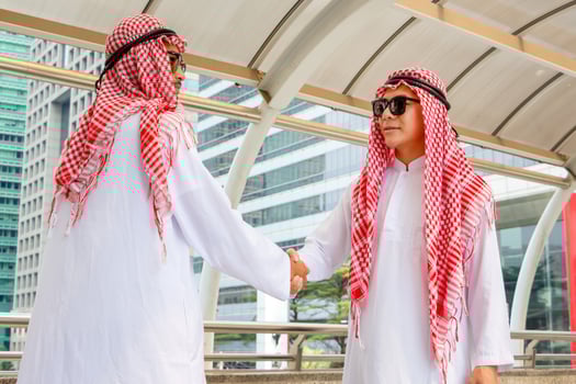 Arab Middle Eastern Businessman handshake, Business meeting with arab man and shaking hands in greetings photo