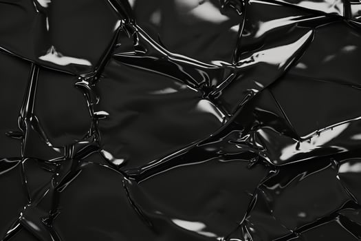 AI generated black crumpled and creased plastic poster texture background photo
