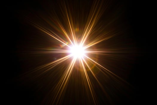 AI generated Easy to add lens flare effects for overlay designs or screen blending mode to make high-quality images. Abstract sun burst, digital flare, iridescent glare over black background. photo