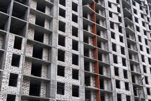 background - a wall of a building under construction photo