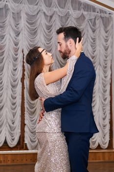 couple dancing gentle sensual dance indoor photo