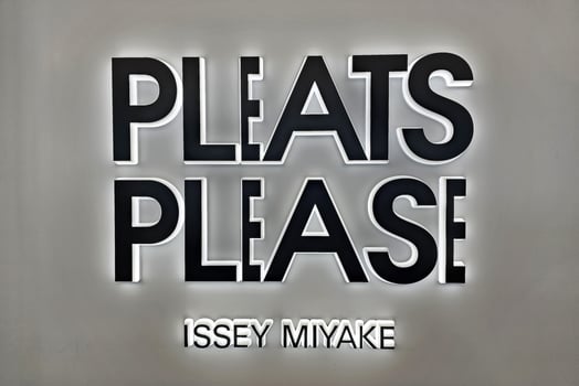 FUKUOKA, JAPAN  NOVEMBER 19, 2023 Pleats Please ISSEY MIYAKE sign. It is a famous Japanese fashion store. photo