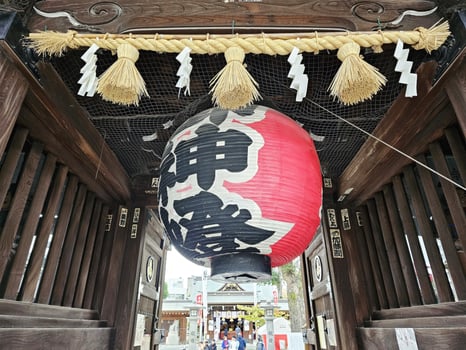 FUKUOKA, JAPAN NOVEMBER 13, 2023 Red lantern in front of Kushida Jinja shrine is a Shinto shrine located in Hakata-ku, Fukuoka, Japan, was founded in in 757. photo