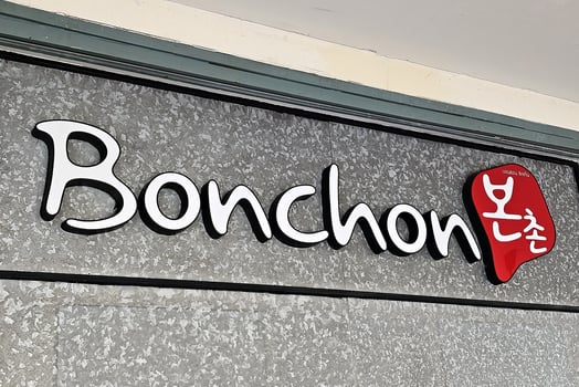 BANGKOK, THAILAND SEPTEMBER 14, 2023 Bonchon Sign. Bonchon Chicken is an international Korean fried chicken restaurant franchise, Founded in 2002. photo