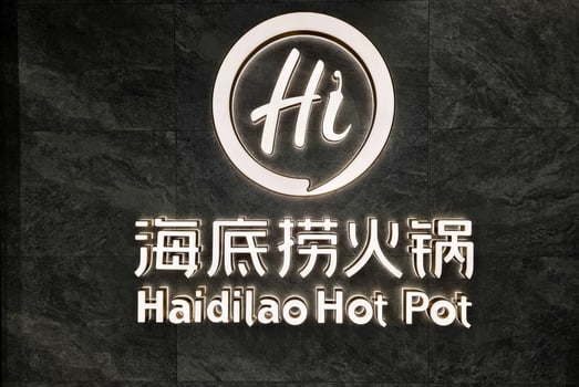 BANGKOK, THAILAND SEPTEMBER 14, 2023 Haidilao Hot Pot Sign, Haidilao is a famous Chinese Restaurant in China and Thailand. It is founded in Jianyang, Sichuan, China in 1994. photo