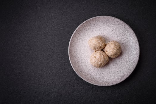 Delicious healthy steamed chicken cutlets or minced meatballs photo