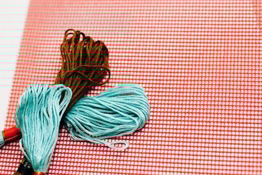 Muslin threads for embroidery and plastic canvas. photo