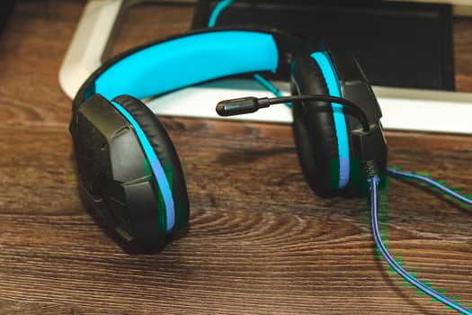 Gaming headphones with a microphone headset on the table photo