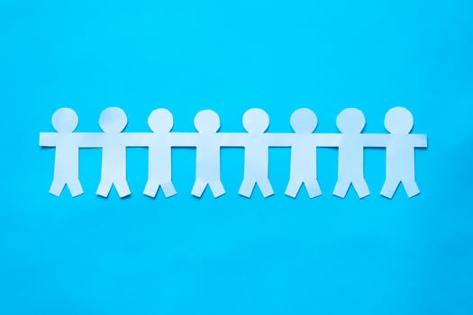 people chain paper on blue photo
