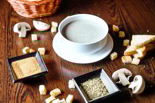 Wooden Table With Plates and Bowls Filled With Food photo