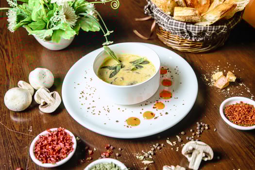 Wooden Table Displaying Assorted Food Bowls photo