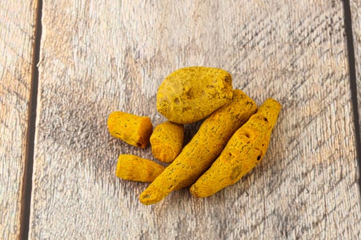 Indian spices - Turmeric root Curcuma photo