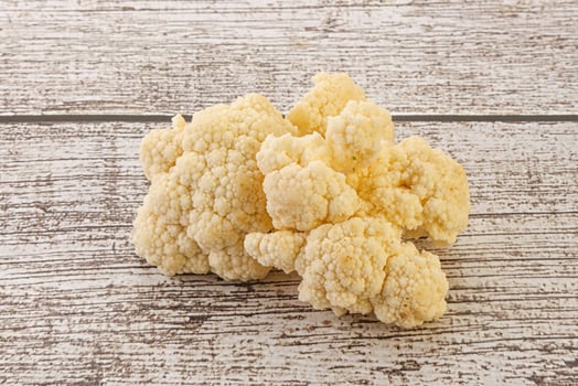 Raw white cauliflower cabbage heap photo