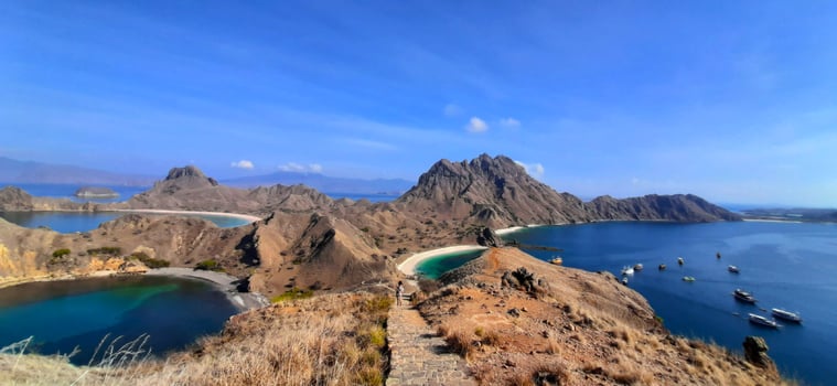 beautiful natural charm featuring beautiful hills on a island decorated with sea around it photo