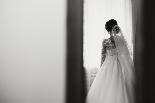 Bride dressing wedding gown. morning bride. photo