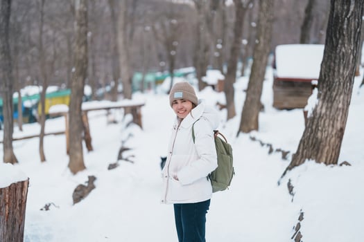 Woman tourist with snow in winter season at Zao fox village, traveler sightseeing Miyagi prefecture. landmark and popular for attraction near Sendai, Tohoku, Japan. Travel and Vacation photo
