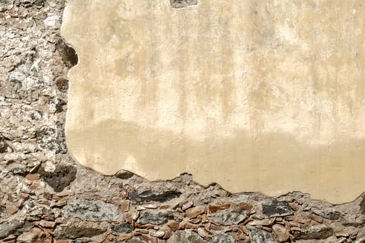 Old wall texture with broken plaster and space for text photo