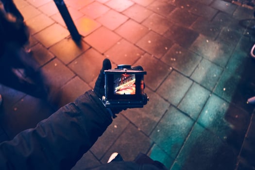 Looking through viewfinder of vintage TLR Camera photo
