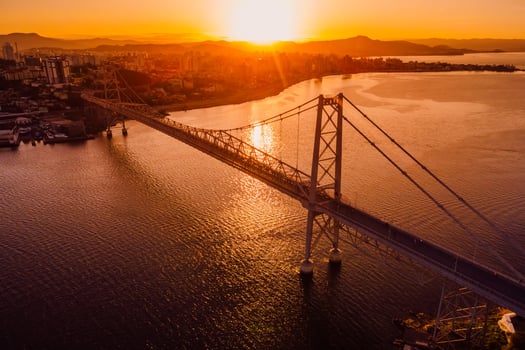 Hercilio luz bridge with warm sunset in Florianopolis. Aerial view photo