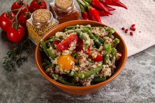 Vegan boiled quinoa with vegetables photo